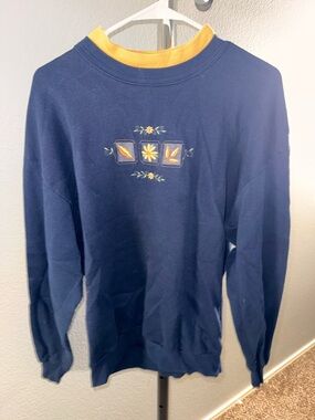 Women's Navy Crewneck Sweatshirt with Yellow Trim and Floral Embroidery